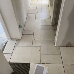 Pose de carrelage motif OPUS